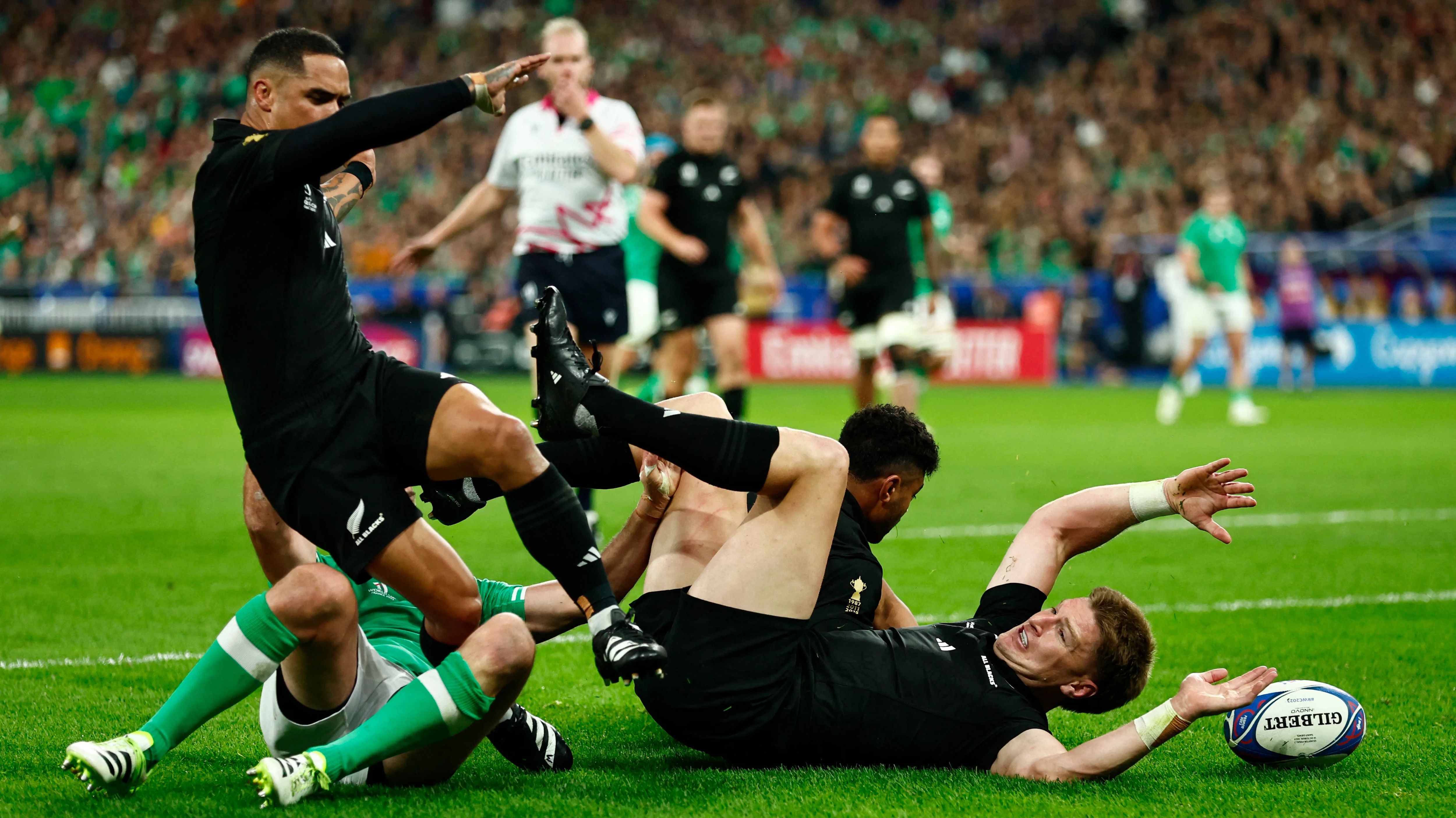 Rugby Union - Rugby World Cup 2023 - Quarter Final - Ireland v New Zealand - Stade de France, Saint-Denis, France - October 14, 2023 New Zealand's Jordie Barrett and Aaron Smith in action REUTERS/Gonzalo Fuentes